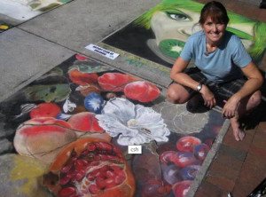 Carolyn Schultz and one of her sidewalk masterpieces
